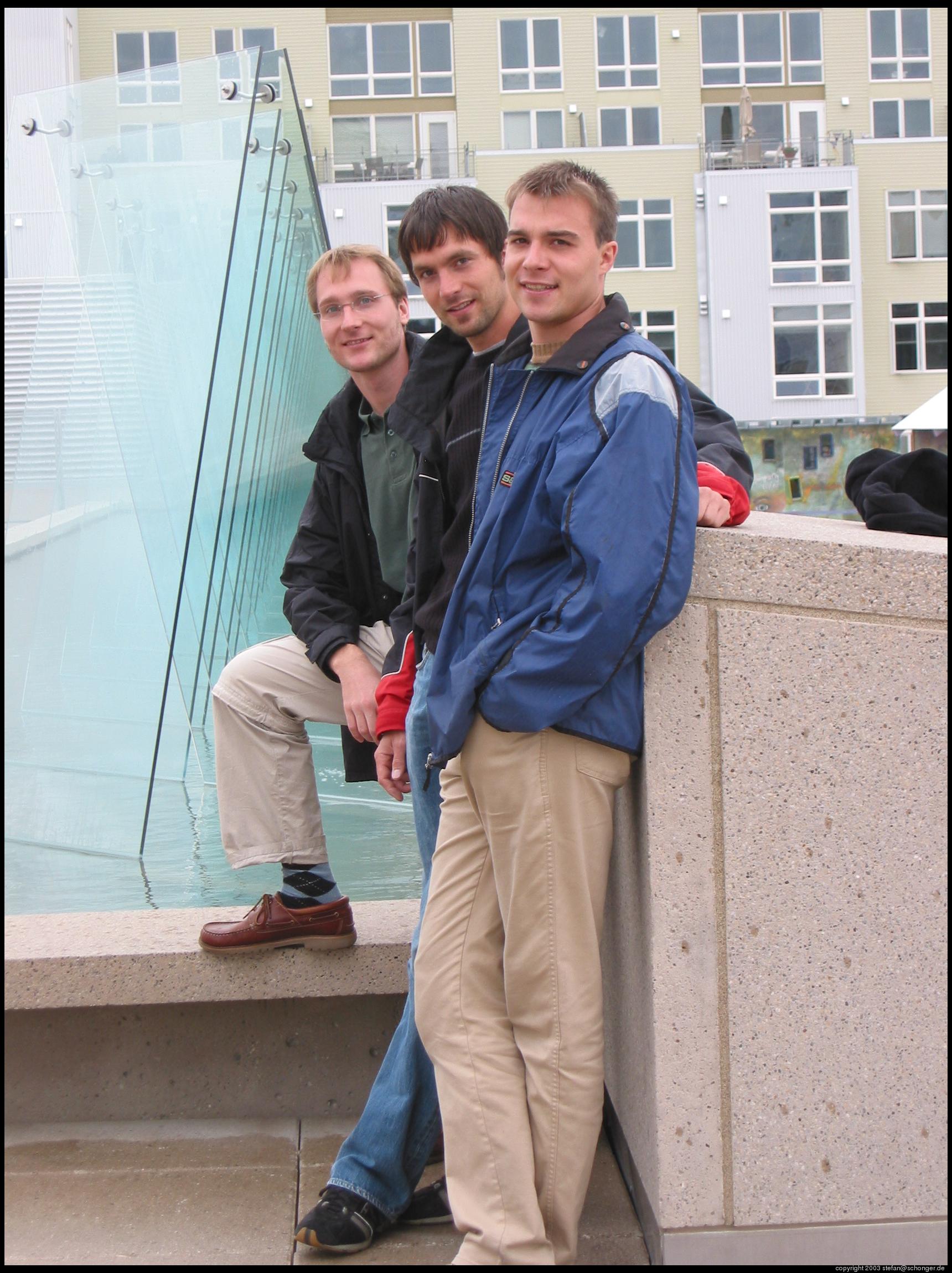 three brothers in front of the glass museum, Tacoma, WA